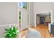Inviting foyer with hardwood floors, high ceilings, and a view into the dining room at 3638 Sope Creek Farm Se, Marietta, GA 30067