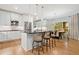 Modern kitchen with stainless steel appliances, island with bar stools, and a breakfast nook at 3638 Sope Creek Farm Se, Marietta, GA 30067