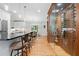 Well-appointed kitchen with island, seating, and wine cellar at 3638 Sope Creek Farm Se, Marietta, GA 30067