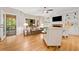 Bright living room with hardwood floors, fireplace, and french doors leading to a patio at 3638 Sope Creek Farm Se, Marietta, GA 30067