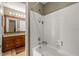 This bathroom features a tiled shower/tub, providing a functional space at 542 Fairway Dr, Woodstock, GA 30189