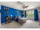 Bedroom with ceiling fan, a large window with backyard views at 542 Fairway Dr, Woodstock, GA 30189