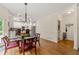 Bright breakfast nook adjacent to the kitchen, offering seamless transition and a view of the outdoors at 542 Fairway Dr, Woodstock, GA 30189