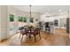 Charming breakfast nook with abundant natural light, perfect for enjoying morning coffee and casual meals at 542 Fairway Dr, Woodstock, GA 30189