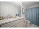 Bathroom features dual sinks, ample countertop space, and a separate shower and toilet area at 149 Archie Way, Woodstock, GA 30188