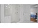Bathroom boasts a sleek glass-enclosed shower and is adjacent to the bedroom at 149 Archie Way, Woodstock, GA 30188