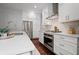 Kitchen featuring quartz countertop and stainless appliances at 149 Archie Way, Woodstock, GA 30188