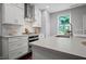 Modern kitchen with new appliances and ample counter space at 149 Archie Way, Woodstock, GA 30188