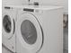 Laundry room featuring new, modern, high-efficiency washing machine and dryer at 149 Archie Way, Woodstock, GA 30188
