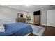 Bedroom showcasing neutral colors, hardwood floors, and natural light at 149 Archie Way, Woodstock, GA 30188