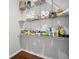 Well-organized pantry with wire shelving units maximizes storage space for food and household goods at 149 Archie Way, Woodstock, GA 30188