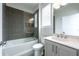 Modern bathroom with sleek gray tile, a glass-enclosed shower, and stylish vanity at 2063 Wheaton Way, Sandy Springs, GA 30328