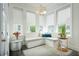Cozy breakfast nook with built-in seating, bright windows, and natural light at 2063 Wheaton Way, Sandy Springs, GA 30328