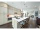 Well-lit kitchen with granite countertops, stainless steel appliances, and open layout at 2063 Wheaton Way, Sandy Springs, GA 30328
