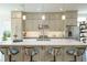 Spacious kitchen featuring a large island with seating, modern appliances, and ample cabinet space at 2063 Wheaton Way, Sandy Springs, GA 30328