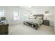 Cozy main bedroom with carpet, neutral colors, and natural light from windows at 2063 Wheaton Way, Sandy Springs, GA 30328