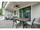 Inviting outdoor patio with a dining table, seating, and a relaxing atmosphere at 2063 Wheaton Way, Sandy Springs, GA 30328