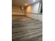Spacious basement with luxury vinyl flooring and trimmed walls, providing a versatile area for various activities at 3261 Stonecreek Ct, Suwanee, GA 30024