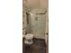 Modern bathroom featuring a glass-enclosed shower with rainfall shower head and elegant tile surround at 3261 Stonecreek Ct, Suwanee, GA 30024