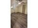 Bright bedroom featuring hardwood floors and a ceiling fan at 3261 Stonecreek Ct, Suwanee, GA 30024