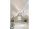 Finished attic with a chandelier, railings, dormer window, and storage racks at 1789 Brandi Ln, Loganville, GA 30052