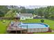 Aerial view of large backyard with above ground pool and fire pit at 1789 Brandi Ln, Loganville, GA 30052