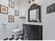 Charming bathroom featuring black and white tile floors and a black vanity at 1789 Brandi Ln, Loganville, GA 30052