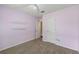 Bedroom featuring plush carpet and built-in shelving at 1789 Brandi Ln, Loganville, GA 30052