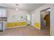 Bright kitchen with a tiled floor and a view of the laundry room at 1789 Brandi Ln, Loganville, GA 30052