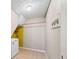 Efficient laundry area with washing machine and storage shelves at 1789 Brandi Ln, Loganville, GA 30052