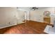 Hardwood floor, light-filled living room with seamless flow into adjacent rooms at 1789 Brandi Ln, Loganville, GA 30052
