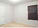 Cozy bedroom with neutral carpet, gray walls, and a window with dark blinds at 20 Sloane Ct, Covington, GA 30016