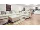 Spacious living room area seamlessly connecting to the kitchen, perfect for entertaining guests at 20 Sloane Ct, Covington, GA 30016