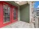 Cozy balcony with red double doors and a view of the surrounding area at 2114 Gorman Se Grv, Atlanta, GA 30316