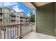 This balcony offers views of nearby buildings and lush greenery at 2114 Gorman Se Grv, Atlanta, GA 30316