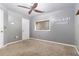Bedroom with plush carpet, ceiling fan and a window that provides natural light at 2114 Gorman Se Grv, Atlanta, GA 30316