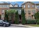Charming townhomes featuring diverse exteriors and lush landscaping enhance curb appeal at 2114 Gorman Se Grv, Atlanta, GA 30316
