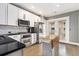 Modern kitchen featuring stainless steel appliances, white cabinets, and stylish backsplash at 2114 Gorman Se Grv, Atlanta, GA 30316