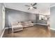 Spacious living room with hardwood floors, ceiling fan, and easy kitchen access at 2114 Gorman Se Grv, Atlanta, GA 30316