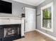 Inviting living room featuring a fireplace, hardwood floors, and neutral gray walls at 2114 Gorman Se Grv, Atlanta, GA 30316