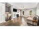 Open living space boasts hardwood floors, natural light, and a fireplace feature at 2114 Gorman Se Grv, Atlanta, GA 30316
