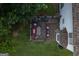 An aerial view of a backyard deck with chairs and a grill at 3269 N Winds N Trl, Douglasville, GA 30135