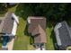 A bird's eye view of a house with roof and lawns and trees at 3269 N Winds N Trl, Douglasville, GA 30135