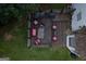 An aerial view of a backyard deck with chairs and a grill at 3269 N Winds N Trl, Douglasville, GA 30135