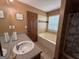 Bathroom features a large vanity and a separate tub and shower at 3269 N Winds N Trl, Douglasville, GA 30135