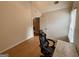 Bedroom with window and a computer chair and desk at 3269 N Winds N Trl, Douglasville, GA 30135