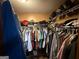 Organized walk-in closet with ample storage space for clothing and accessories at 3269 N Winds N Trl, Douglasville, GA 30135