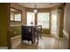 Sunlit breakfast nook with a modern table set and large windows at 3269 N Winds N Trl, Douglasville, GA 30135