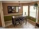Sunlit breakfast nook with a modern table set and large windows at 3269 N Winds N Trl, Douglasville, GA 30135