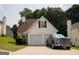Charming home with a two-car garage and well-manicured lawn at 3269 N Winds N Trl, Douglasville, GA 30135